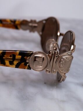 VINTAGE FENDI Tortoiseshell oval Sunglasses with Gold Accents